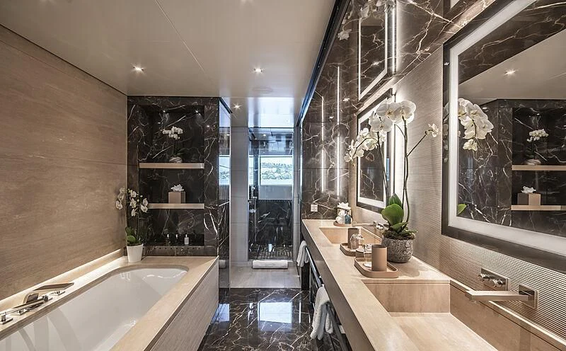 a bathroom with a large mirror aboard SEVERIN°S Yacht for Charter