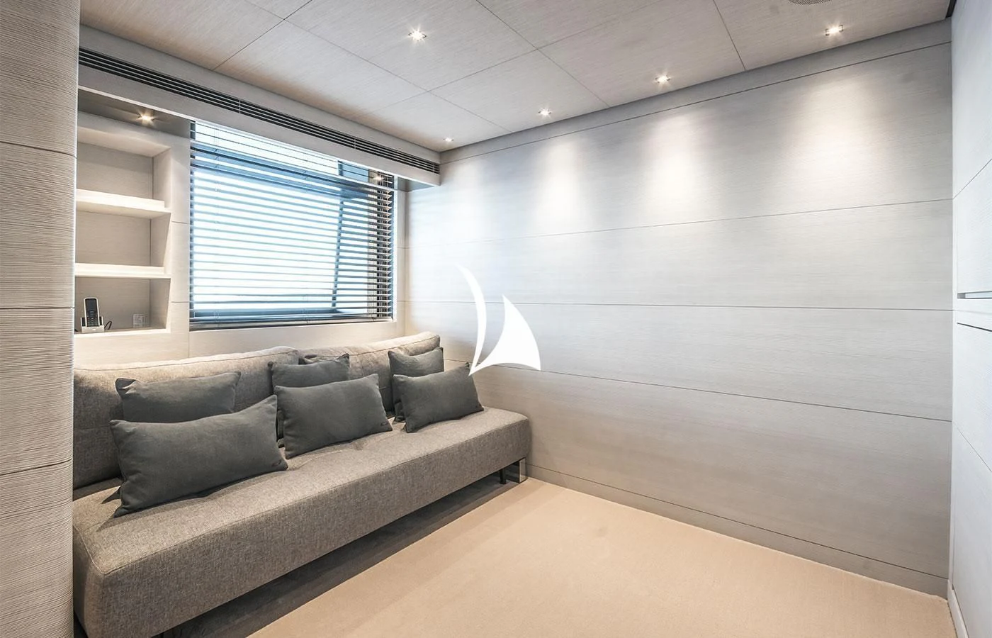 a couch in a room aboard SEVERIN°S Yacht for Charter