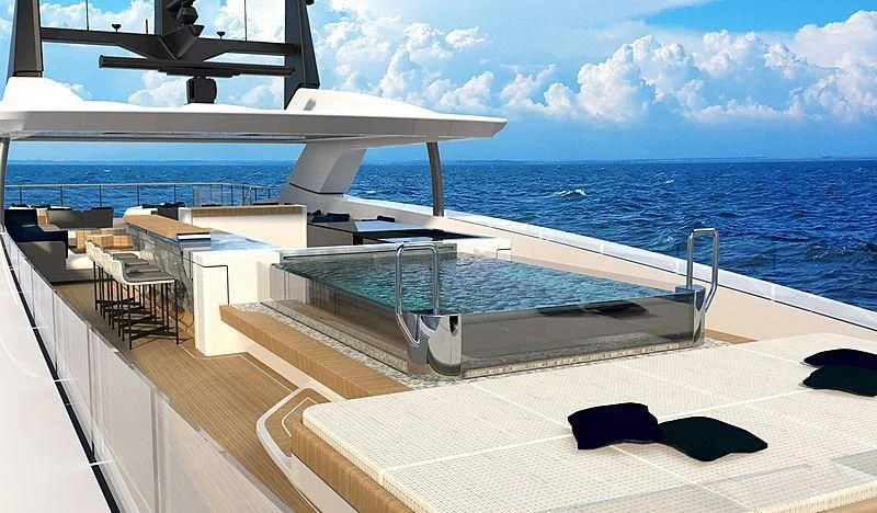 a deck with a large body of water and a boat on it aboard SEVERIN°S Yacht for Charter