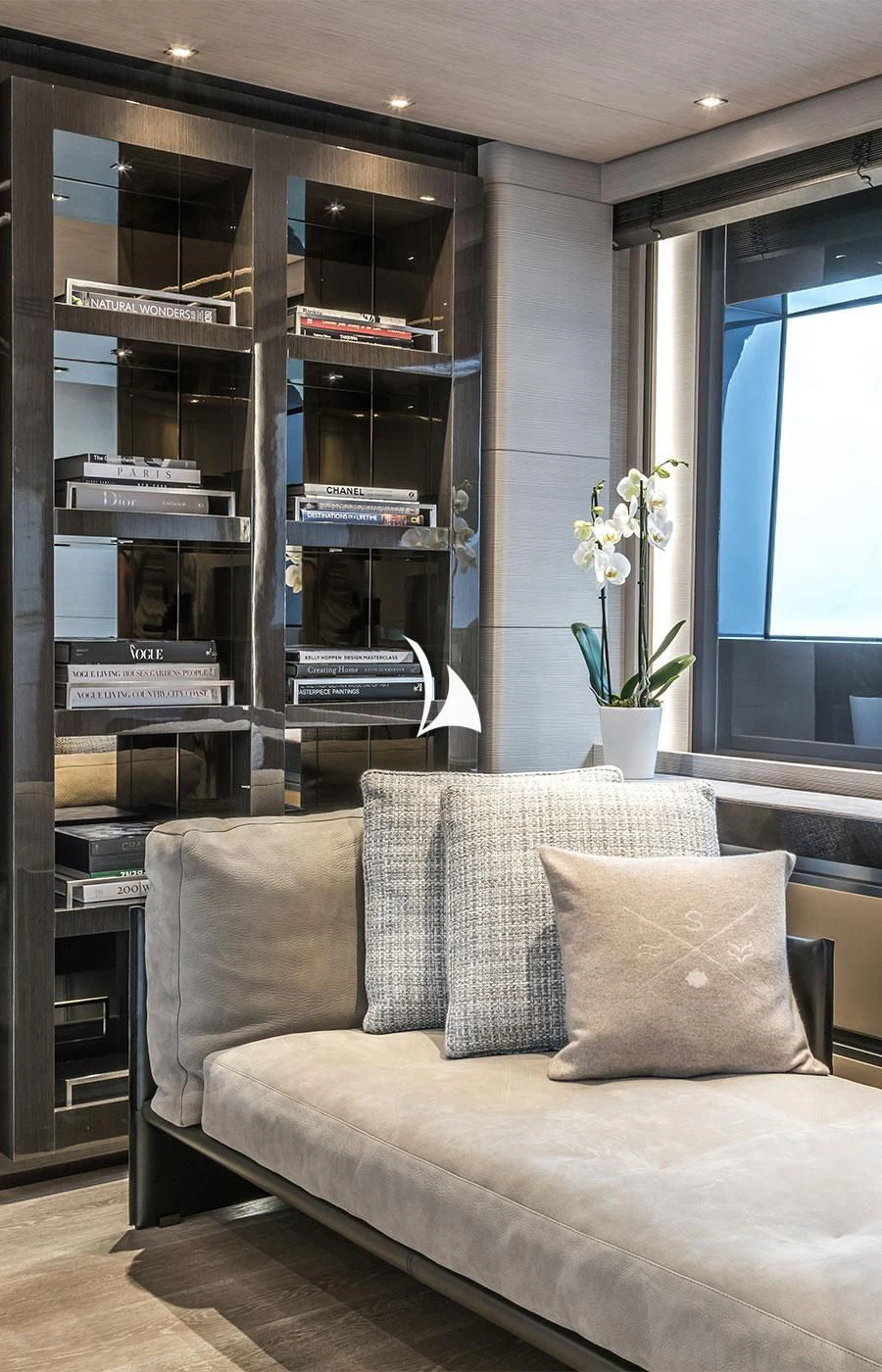 a couch in a room aboard SEVERIN°S Yacht for Charter