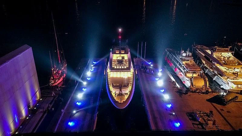 a large ship in a harbor aboard SEVERIN°S Yacht for Charter