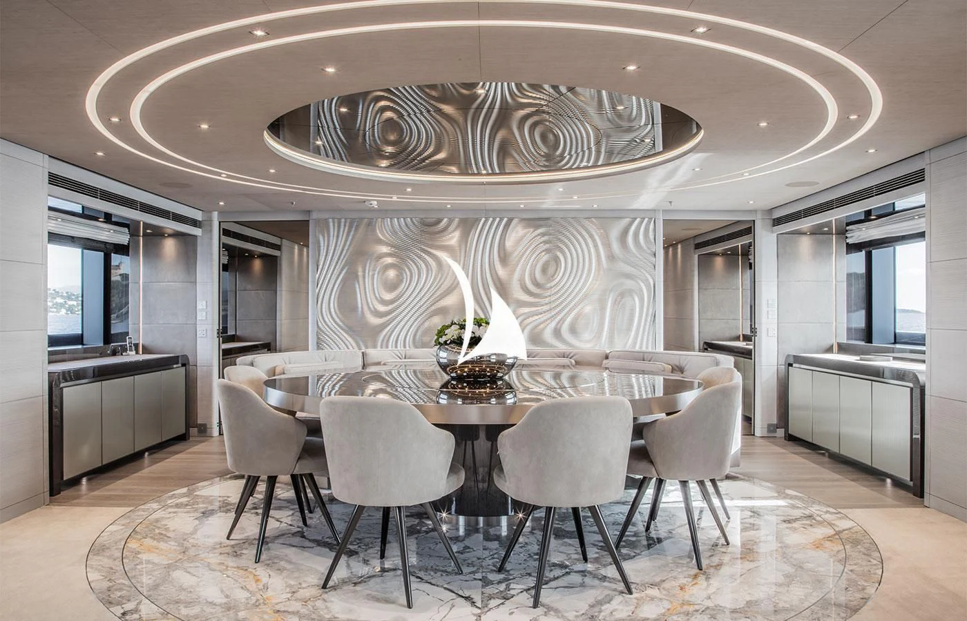 a large kitchen with a table and chairs aboard SEVERIN°S Yacht for Charter