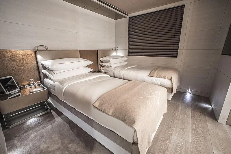 a room with a couple of beds aboard SEVERIN°S Yacht for Charter