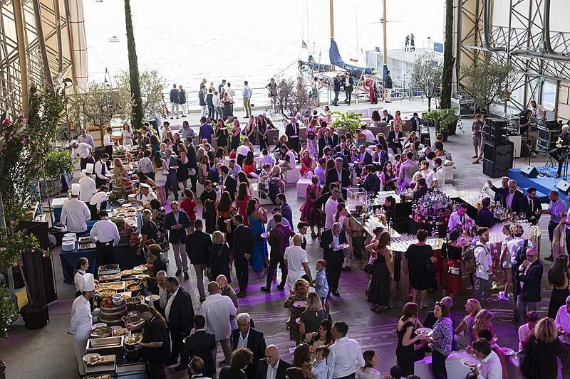 a large crowd of people in a street aboard SEVERIN°S Yacht for Charter