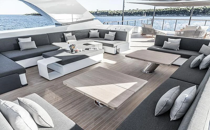 a living room with a large patio aboard SEVERIN°S Yacht for Charter