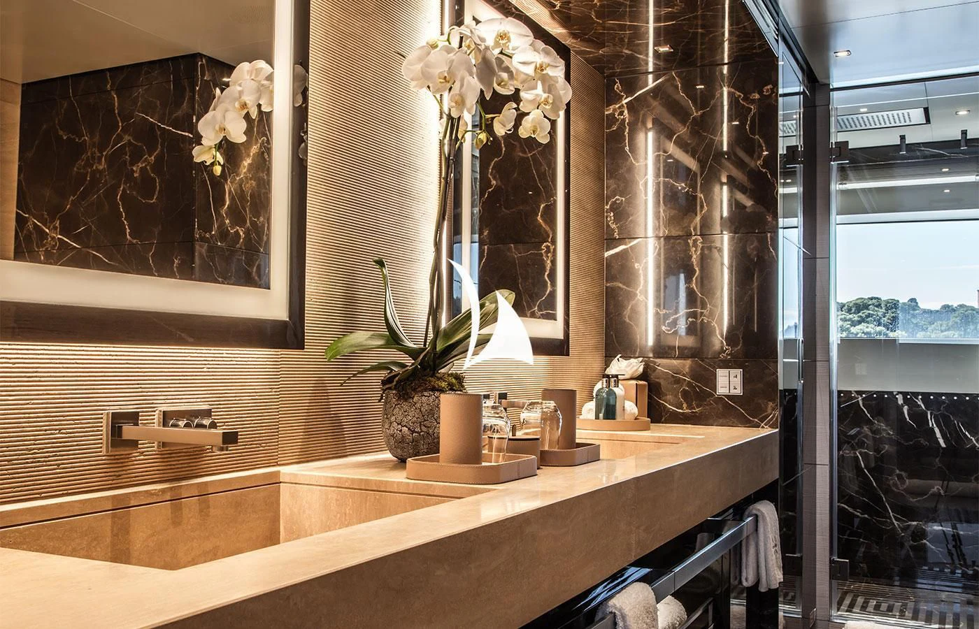 a bathroom with a large mirror aboard SEVERIN°S Yacht for Charter