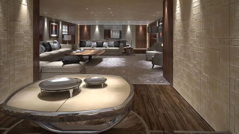 a large living room with a round table aboard SEVERIN°S Yacht for Charter