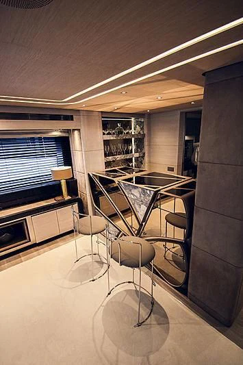 a room with a table and chairs aboard SEVERIN°S Yacht for Charter