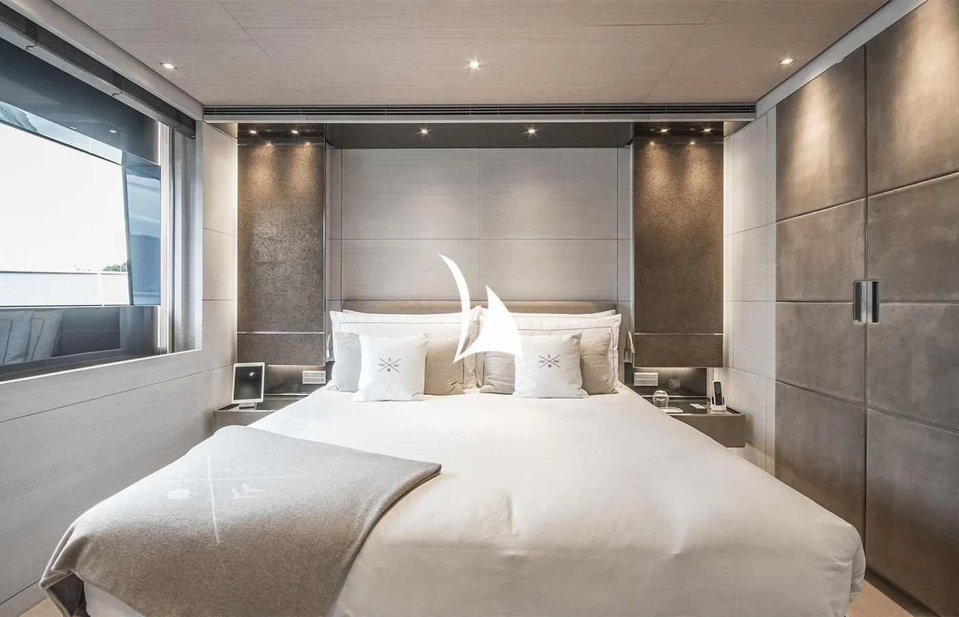 a couple of beds in a room aboard SEVERIN°S Yacht for Charter