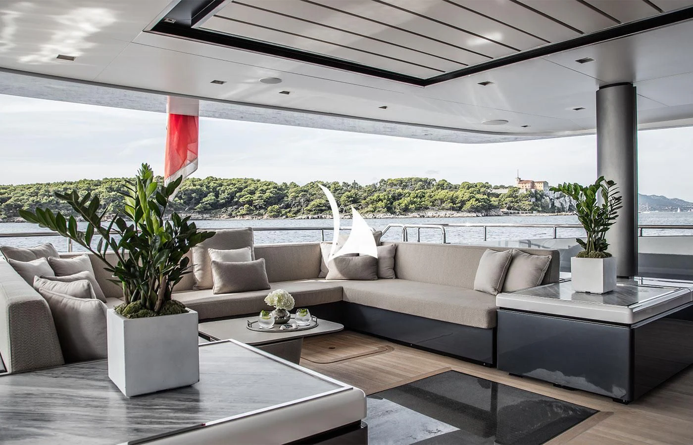 a living room with a large window aboard SEVERIN°S Yacht for Charter