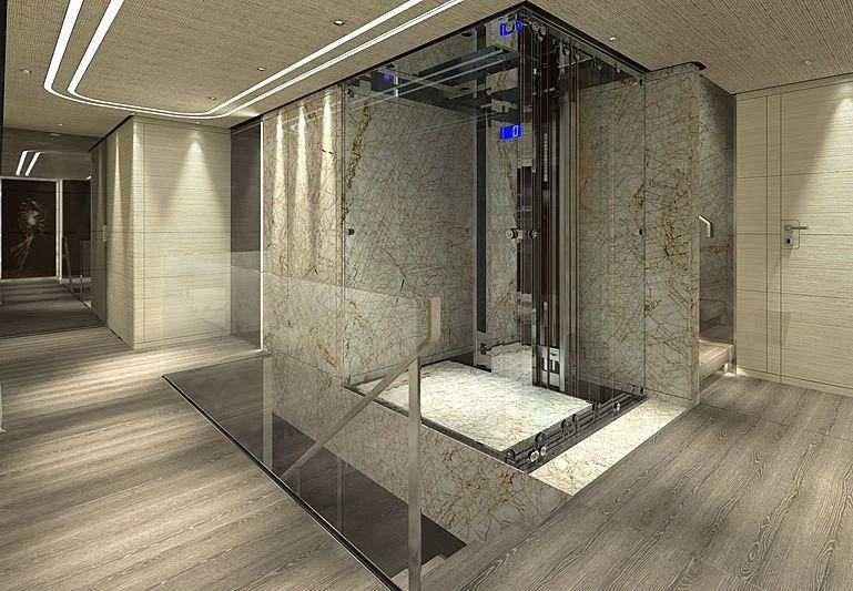 a room with a large wall of glass and wood floors aboard SEVERIN°S Yacht for Charter