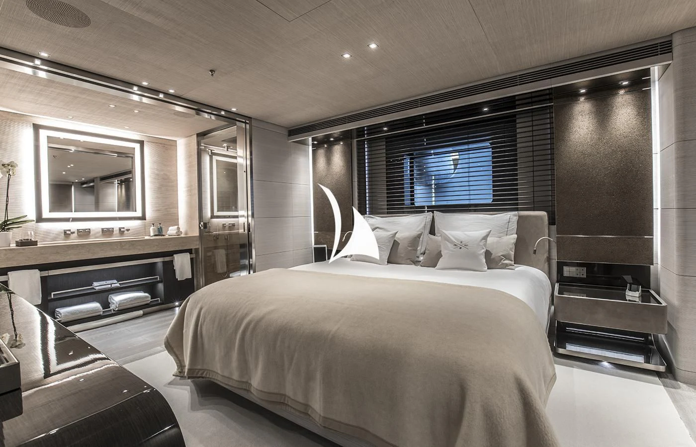a room with a bed and a tv aboard SEVERIN°S Yacht for Charter