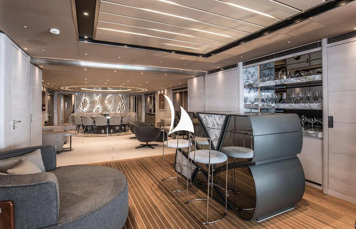 a room with a couch and chairs aboard SEVERIN°S Yacht for Charter