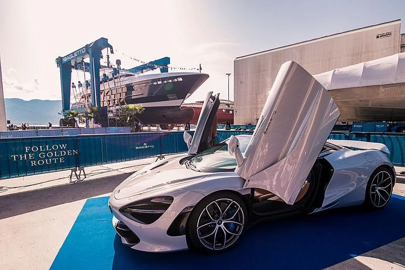 a white sports car with a large white hood aboard SEVERIN°S Yacht for Charter