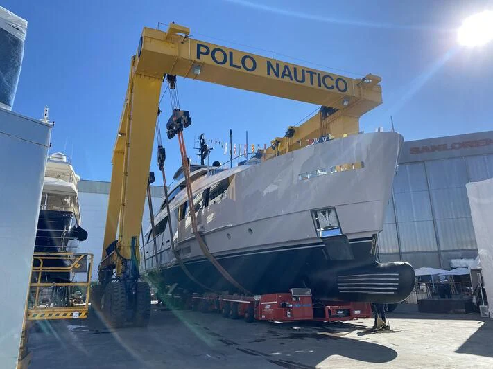 a large crane lifting a large container aboard MARIJA Yacht for Sale