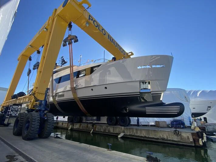 a large yellow crane on a boat aboard MARIJA Yacht for Sale