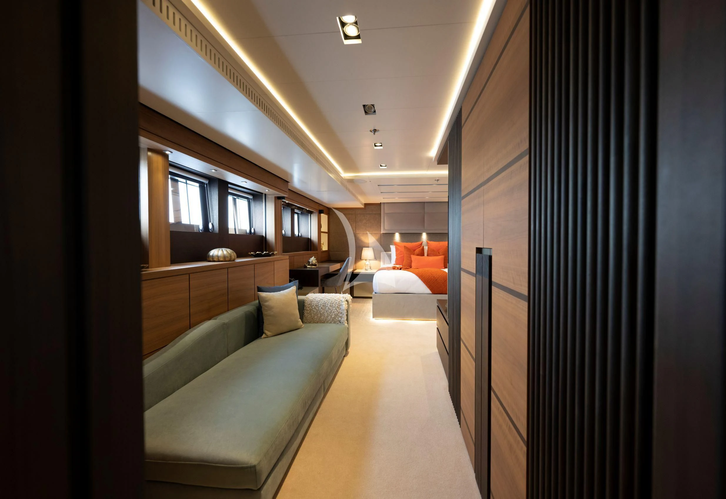 a room with a couch and a bed aboard NAVIS ONE Yacht for Charter
