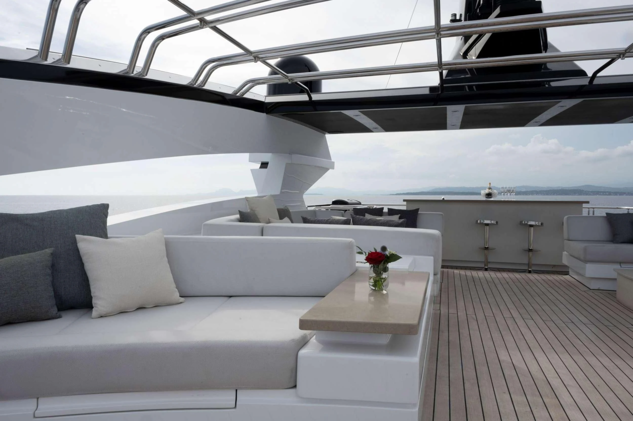 a room with a couch and a table aboard NAVIS ONE Yacht for Charter