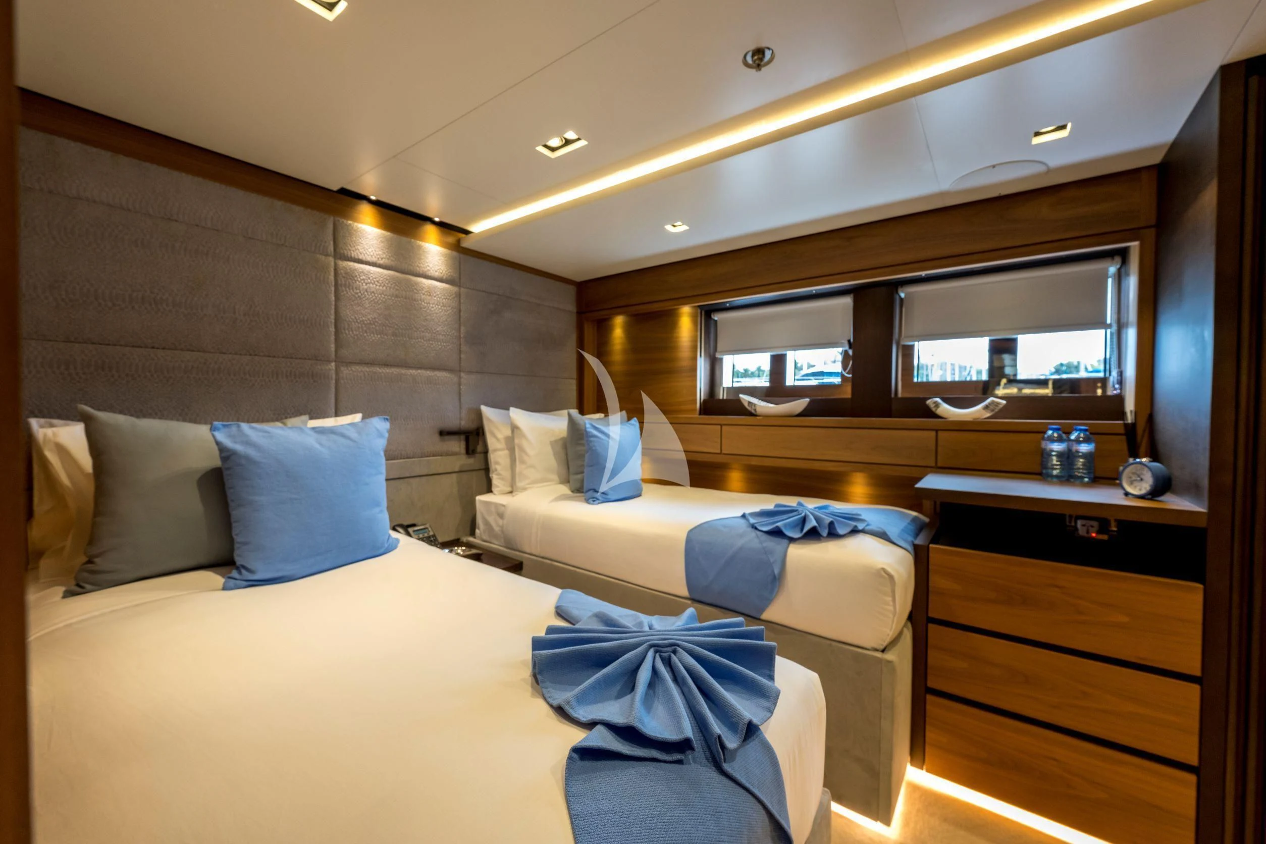 a room with two beds aboard NAVIS ONE Yacht for Charter