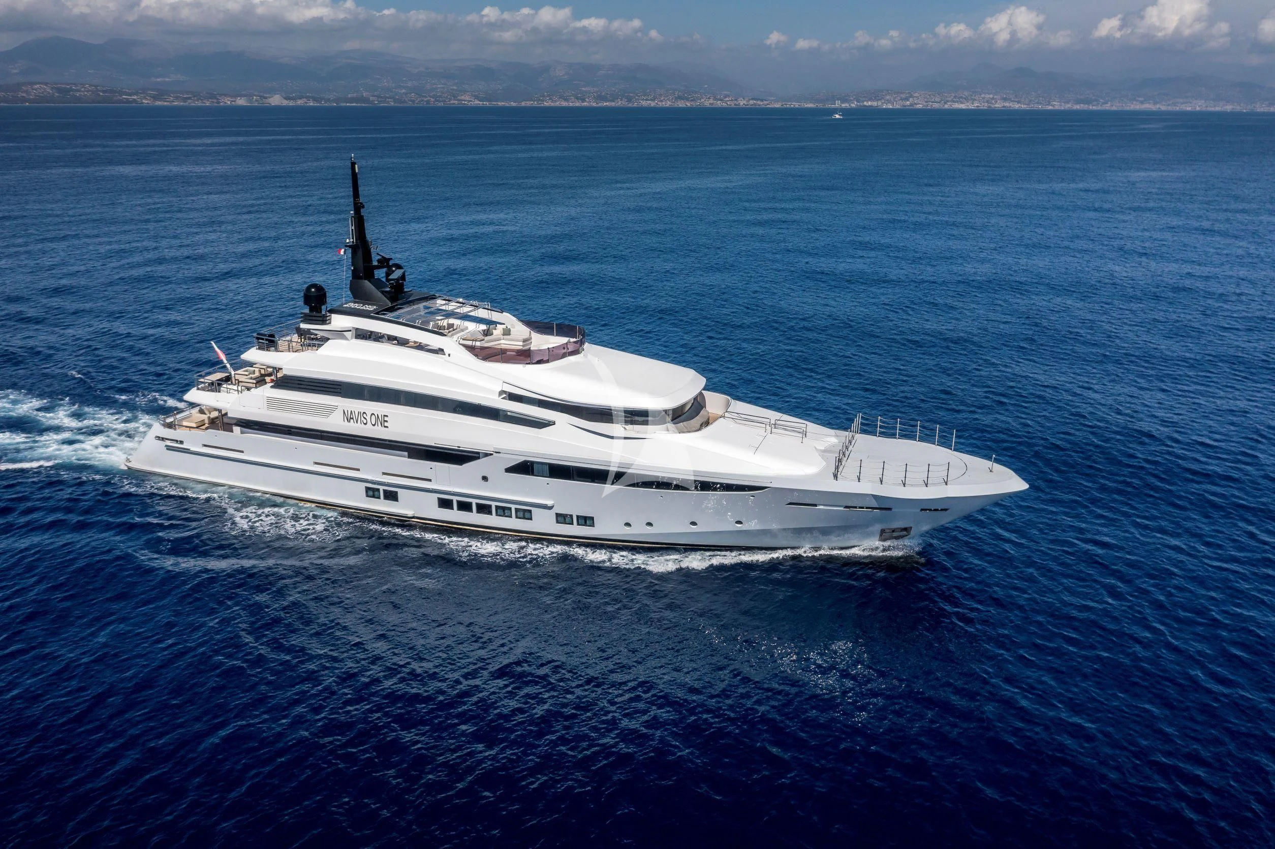 a white yacht in the water aboard NAVIS ONE Yacht for Charter
