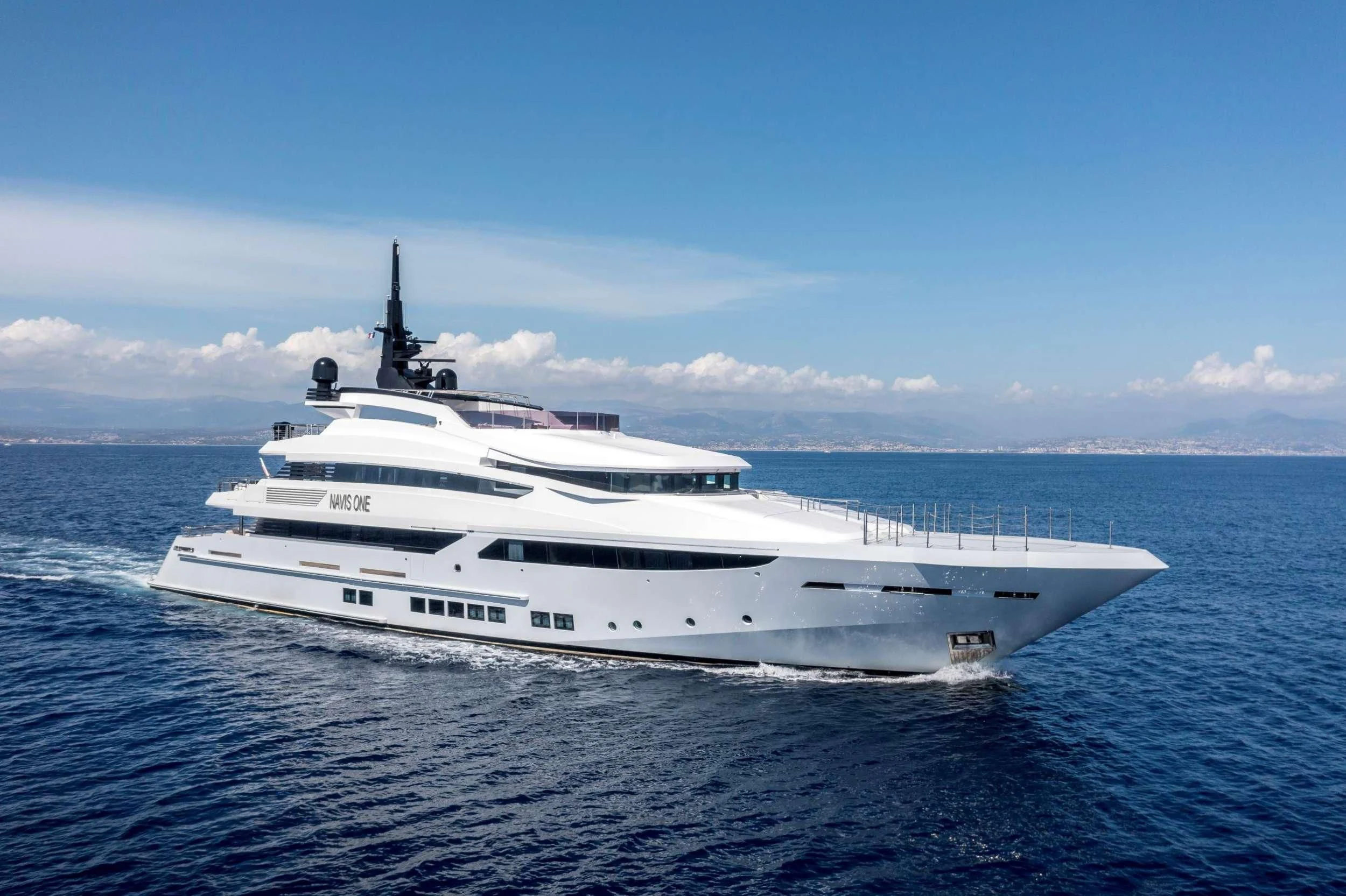 a white yacht in the water aboard NAVIS ONE Yacht for Charter