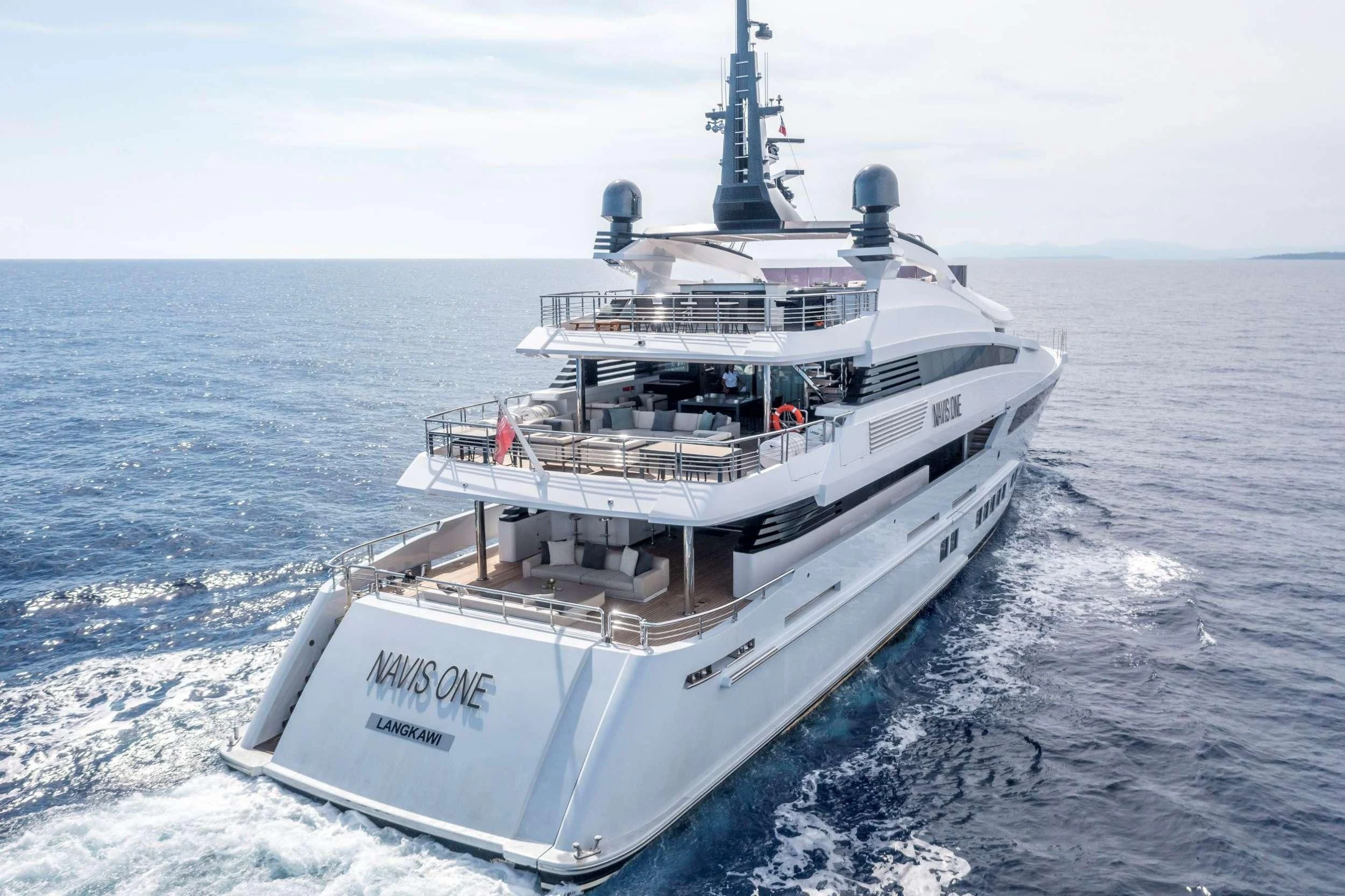 a large white boat in the water aboard NAVIS ONE Yacht for Charter
