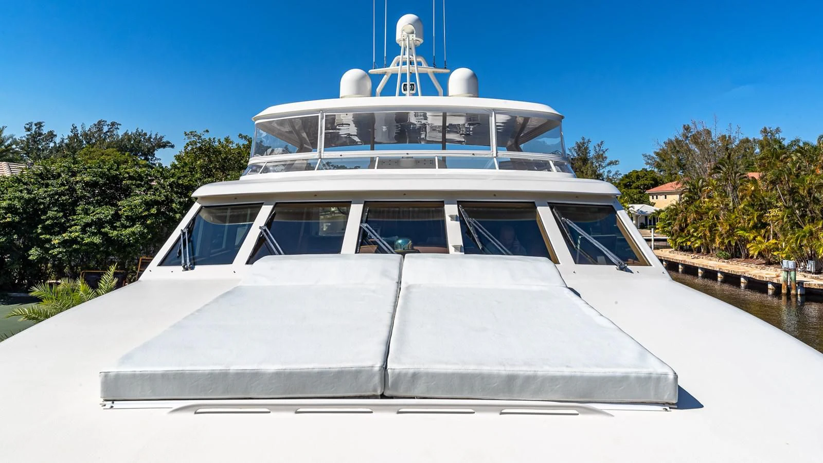 a white boat on a river aboard SEAQUEL Yacht for Sale