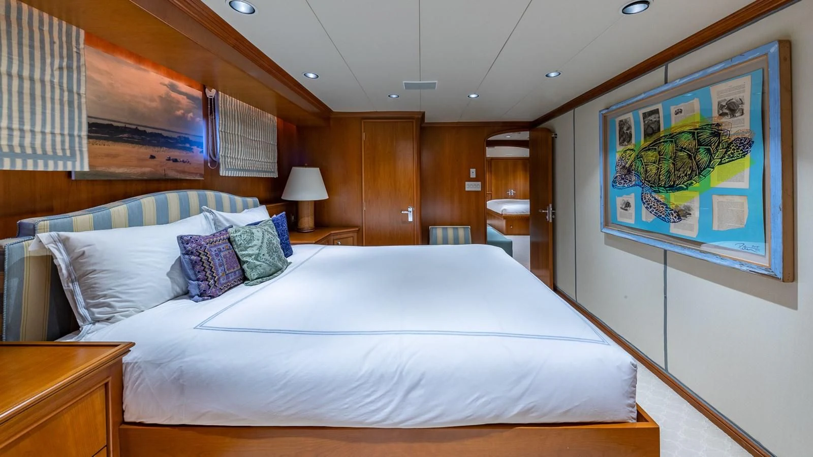 a bedroom with a large bed aboard SEAQUEL Yacht for Sale