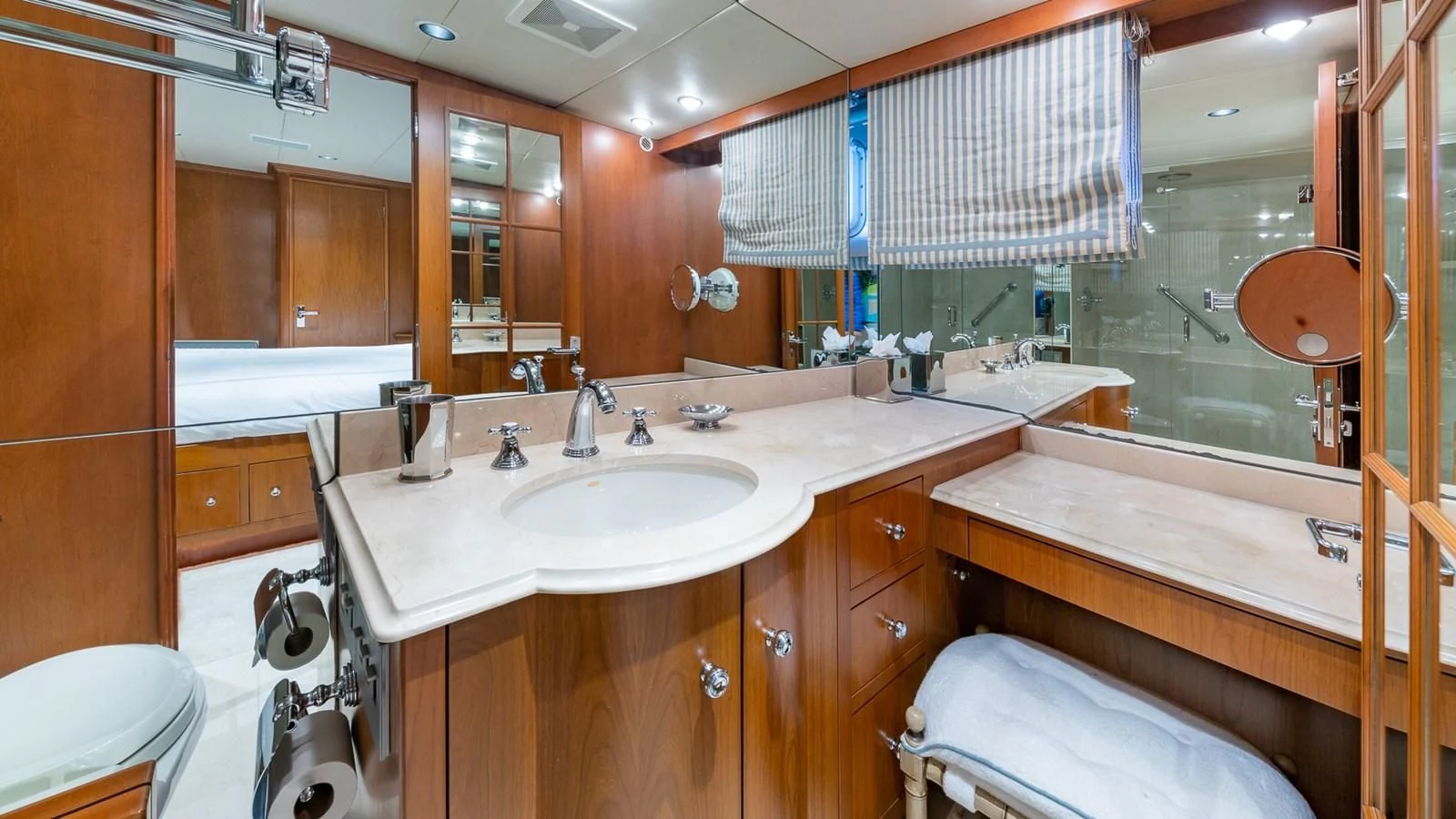 a bathroom with a sink and a mirror aboard SEAQUEL Yacht for Sale