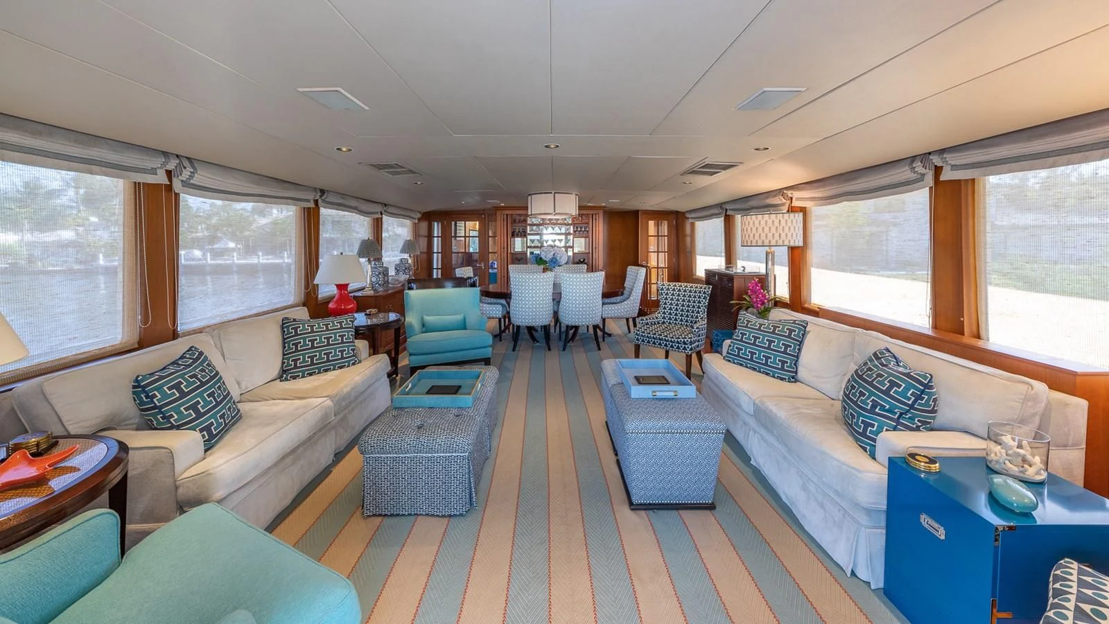a living room with a couch and a table aboard SEAQUEL Yacht for Sale