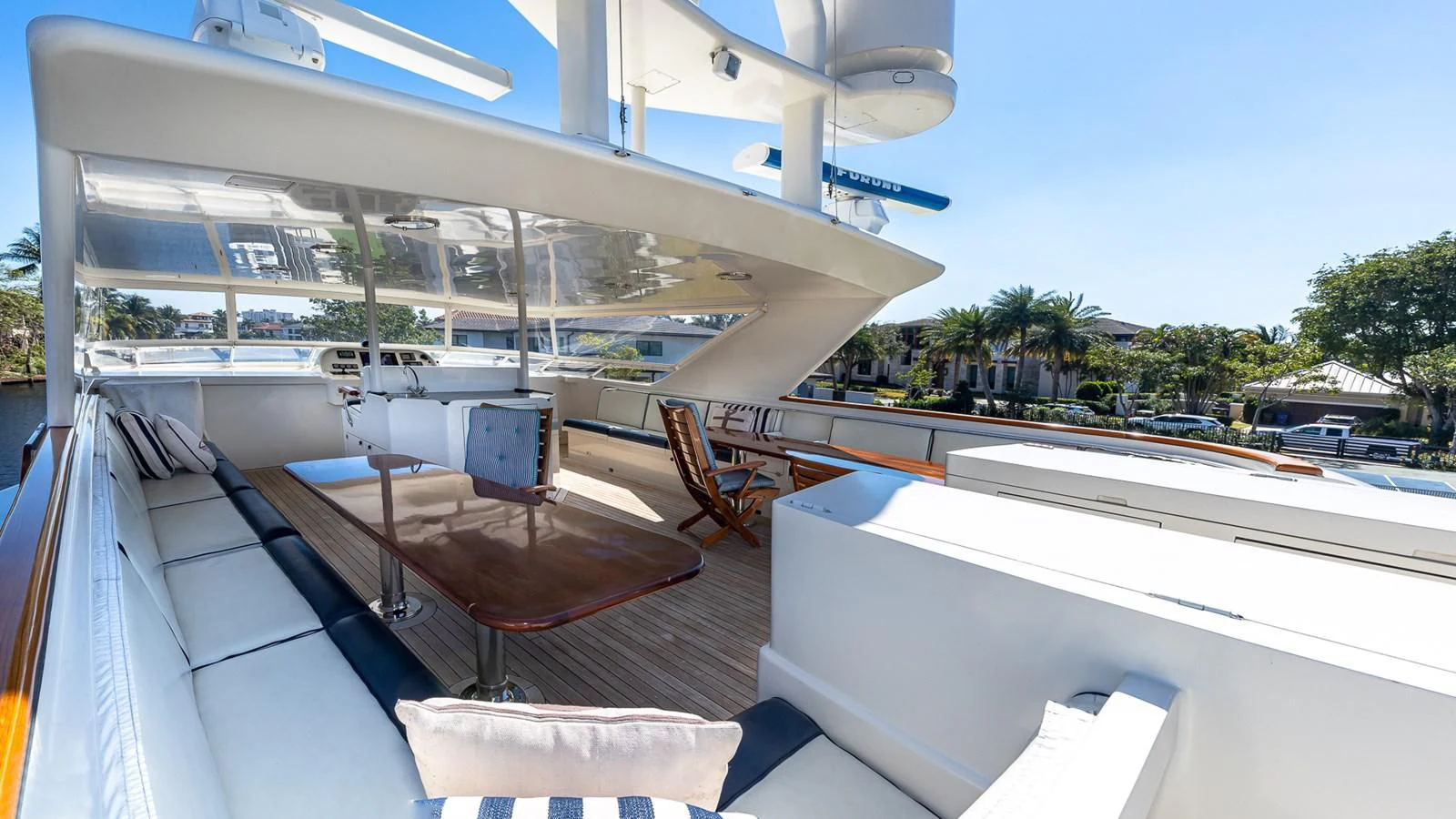 a deck with a deck and a pool aboard SEAQUEL Yacht for Sale