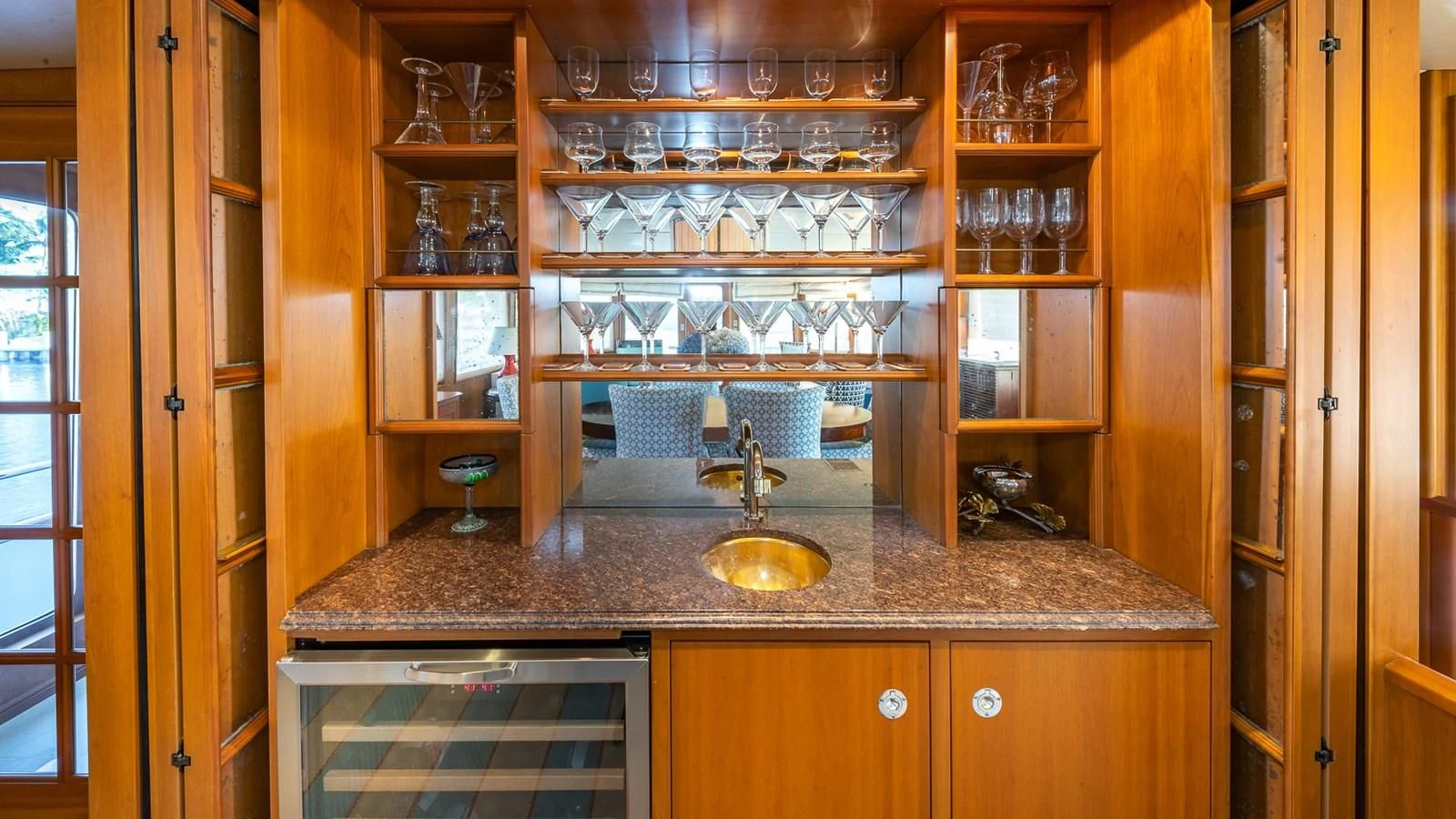 a kitchen with a marble counter top aboard SEAQUEL Yacht for Sale