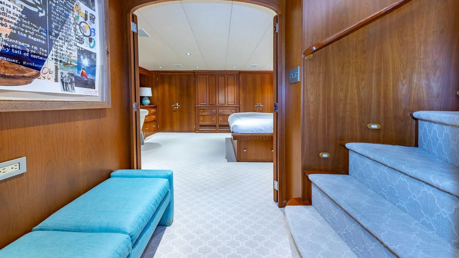 a room with a bed and a desk aboard SEAQUEL Yacht for Sale