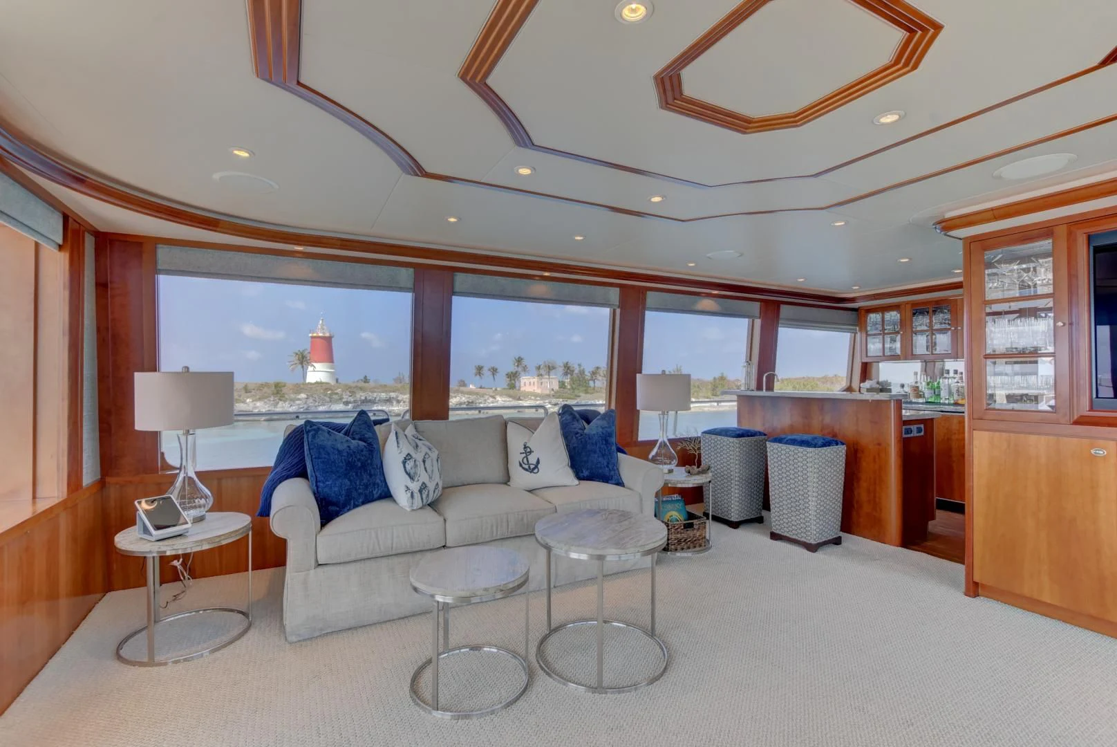 a living room with a large window aboard GOOD TIMES Yacht for Sale