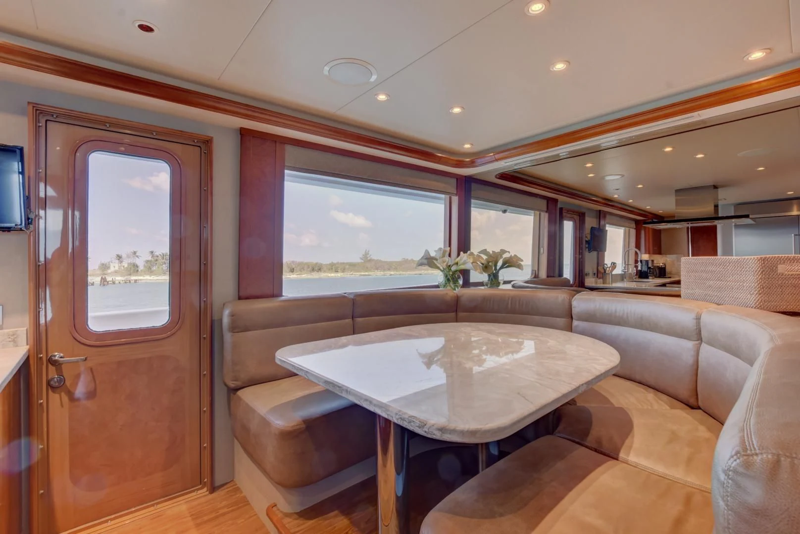 a table and chairs in a room aboard GOOD TIMES Yacht for Sale