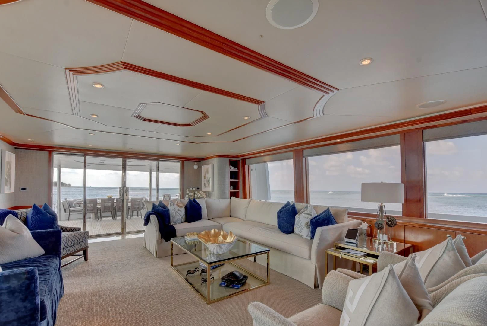 a living room with a large window aboard GOOD TIMES Yacht for Sale
