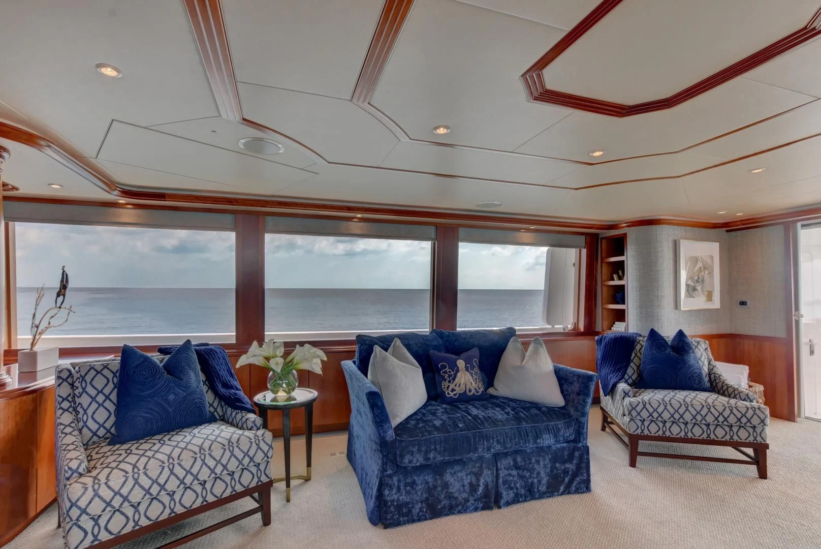 a living room with a large window aboard GOOD TIMES Yacht for Sale