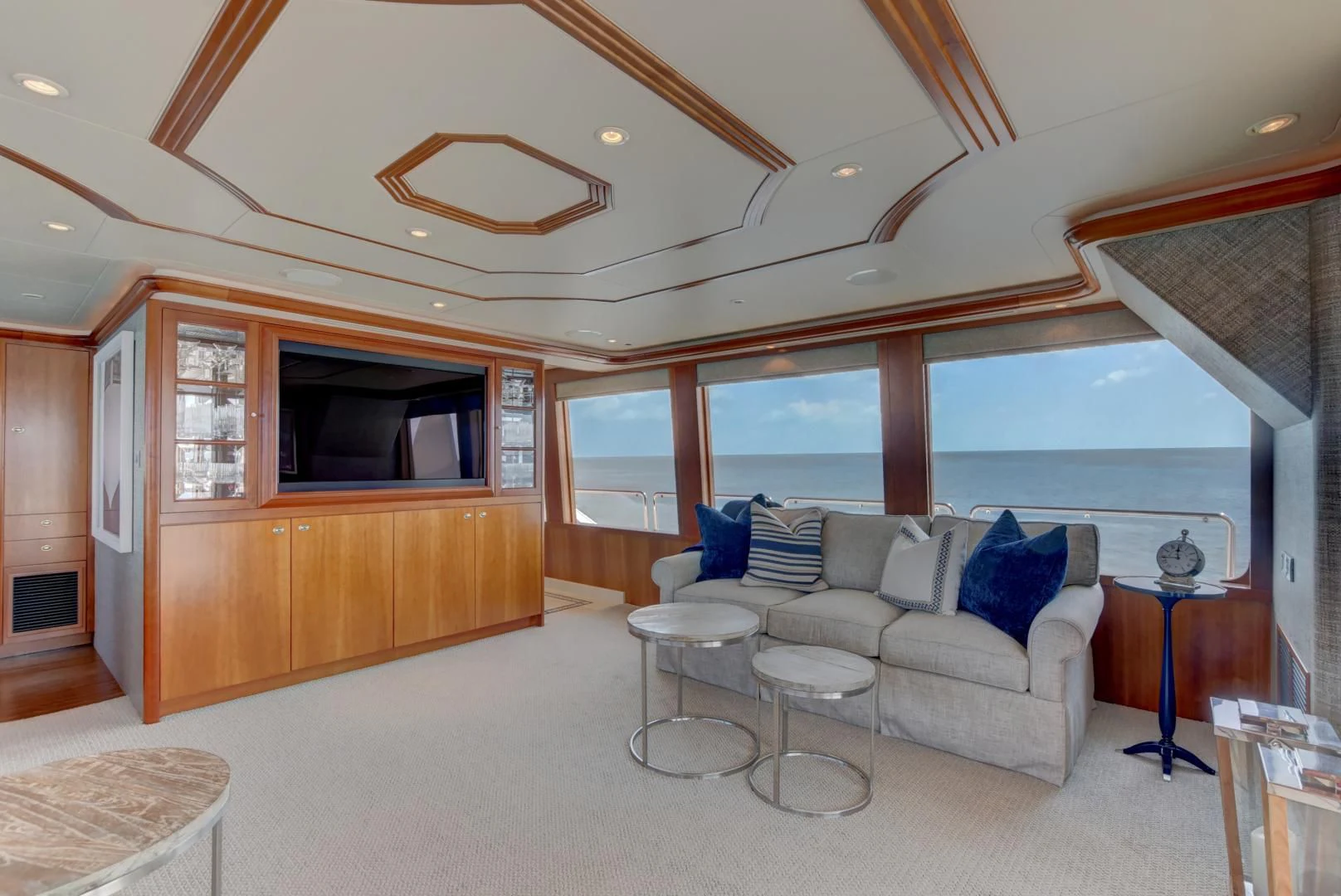 a living room with a large window aboard GOOD TIMES Yacht for Sale