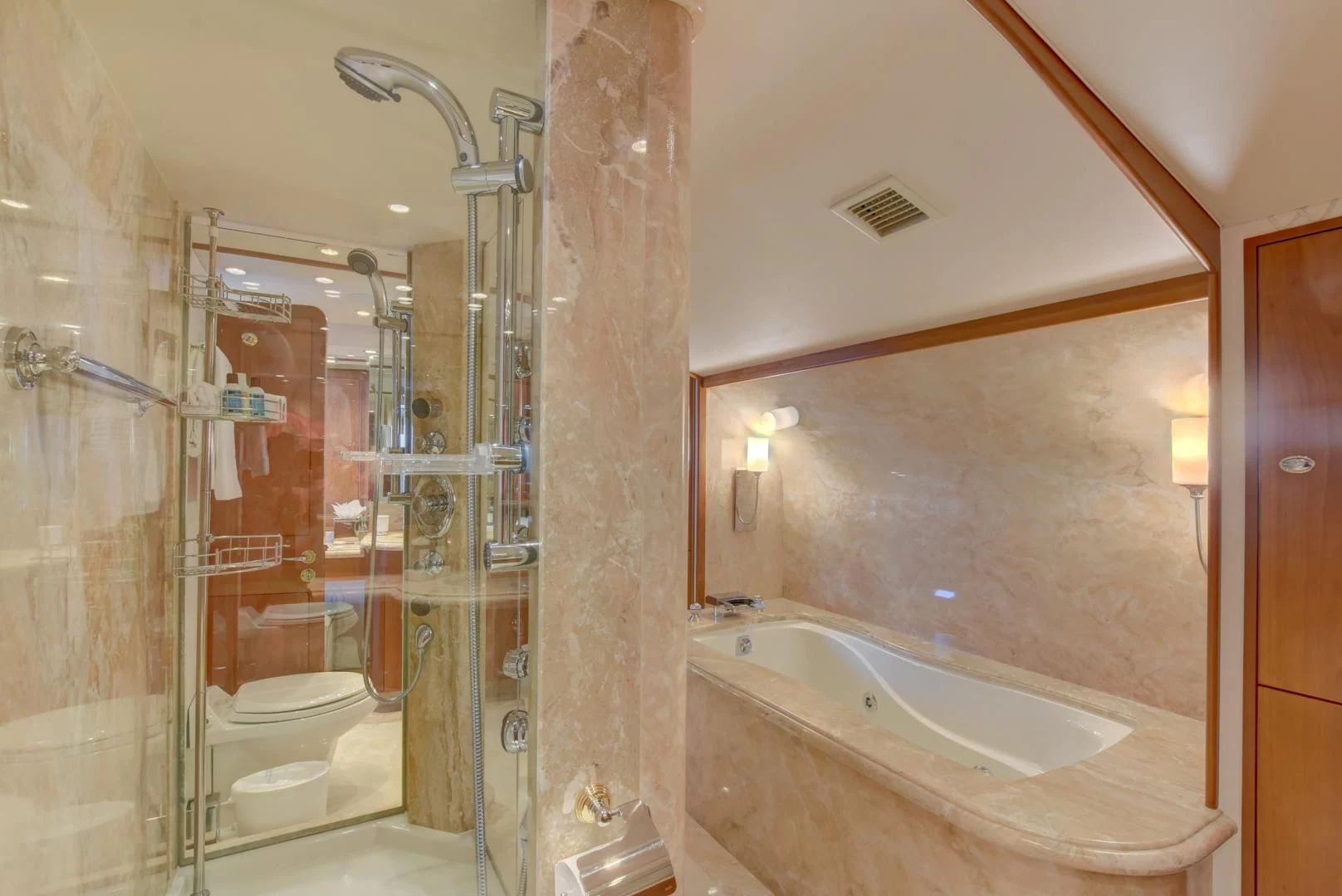 a bathroom with a glass shower aboard GOOD TIMES Yacht for Sale