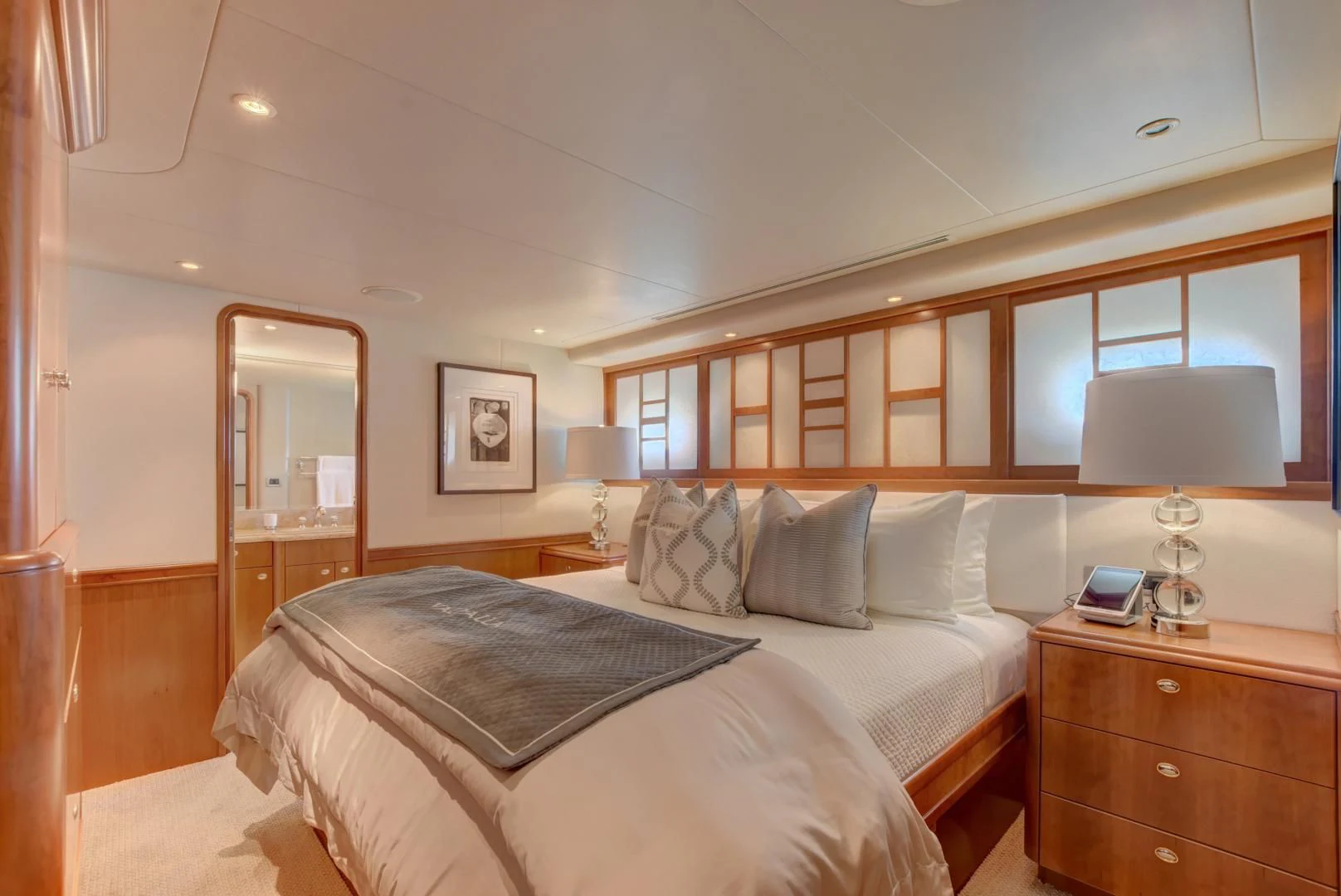 a bedroom with a bed and a desk aboard GOOD TIMES Yacht for Sale