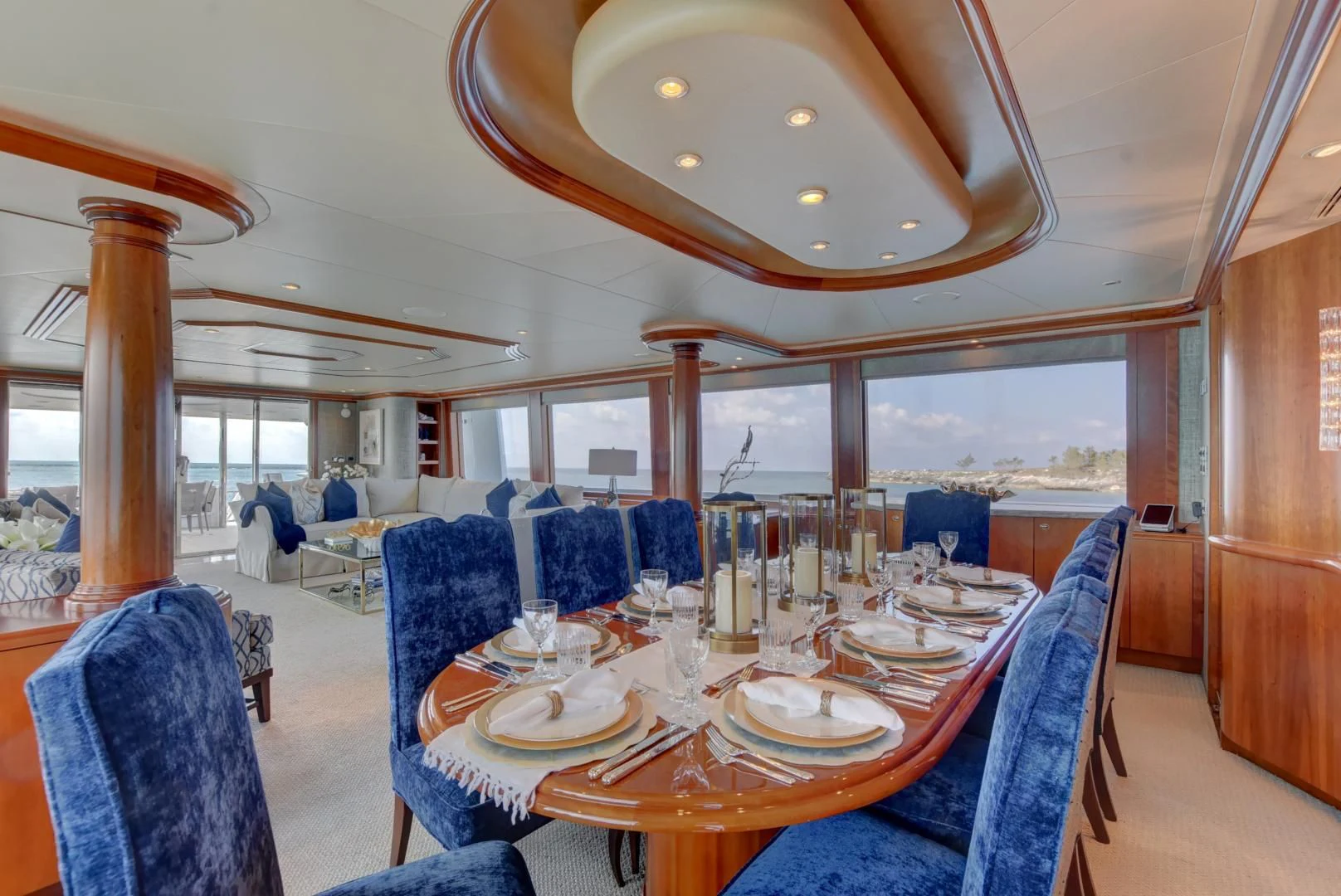 a dining room with a table set aboard GOOD TIMES Yacht for Sale