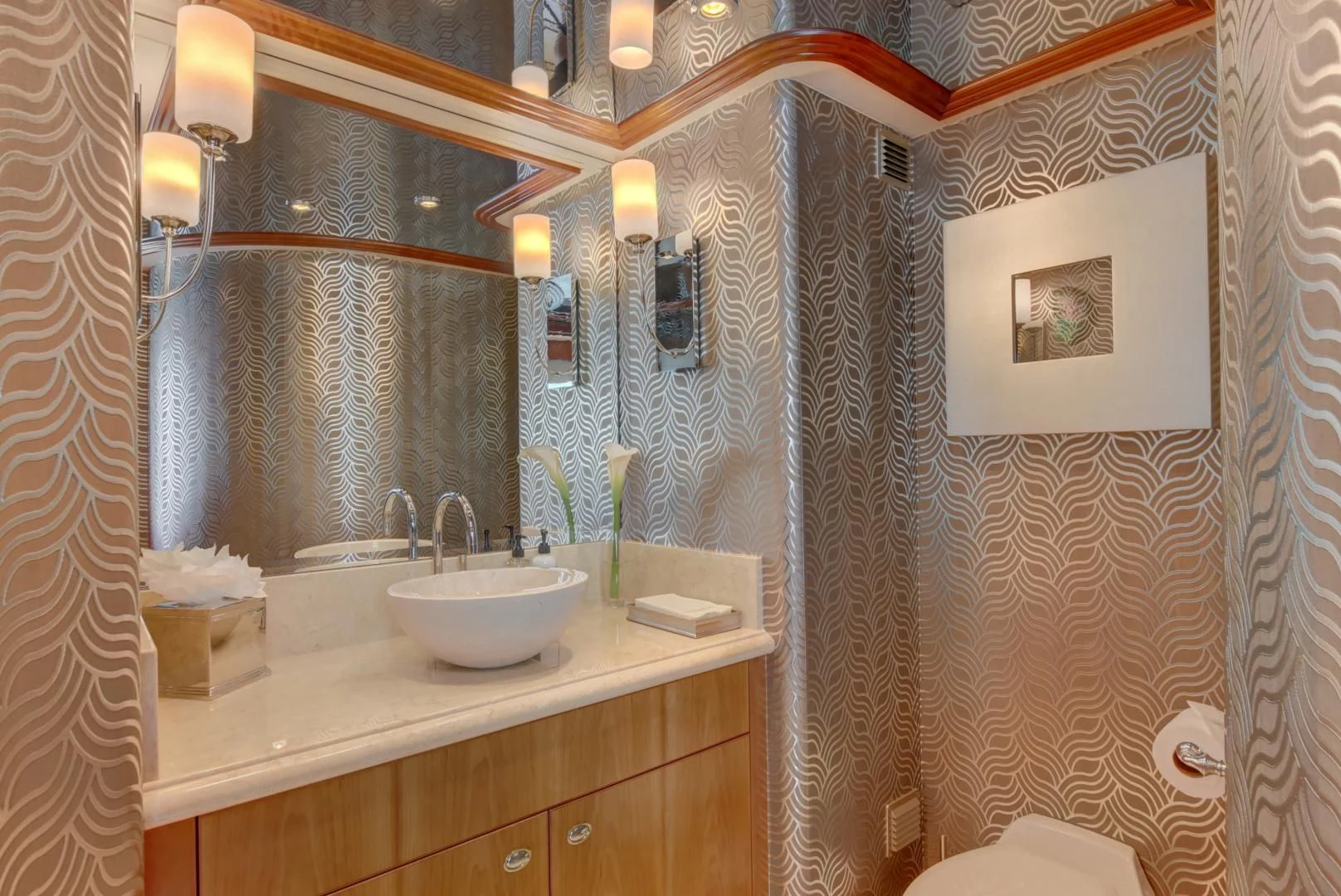 a bathroom with a sink and a mirror aboard GOOD TIMES Yacht for Sale