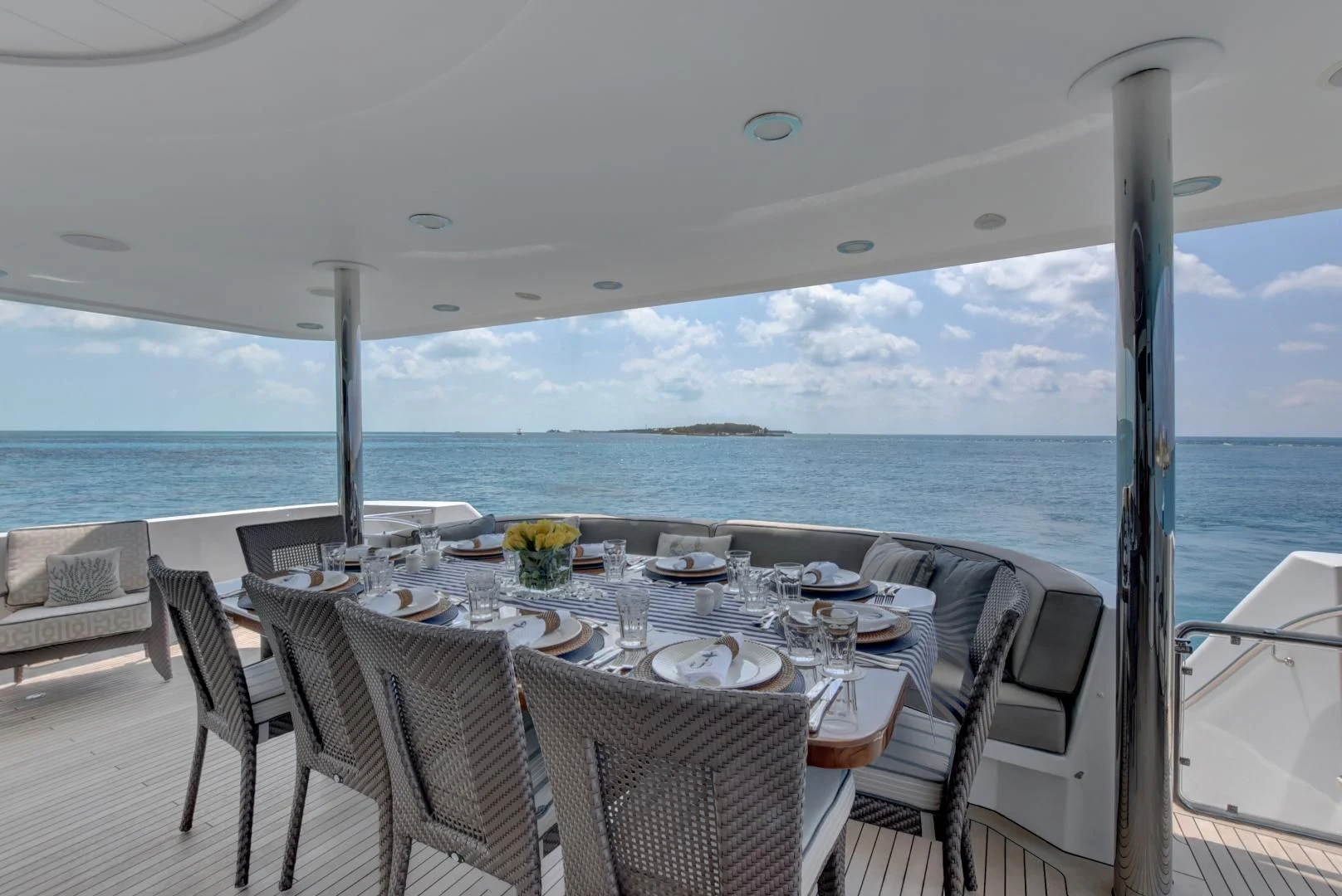 a table set for a meal on a boat aboard GOOD TIMES Yacht for Sale