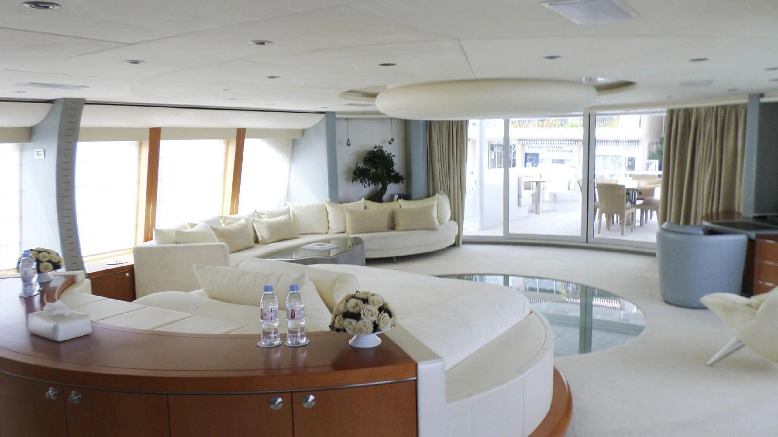 a living room with a large window aboard KING LOUIS Yacht for Sale