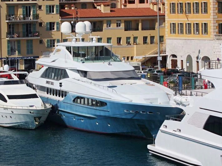 a group of boats in a harbor aboard KING LOUIS Yacht for Sale