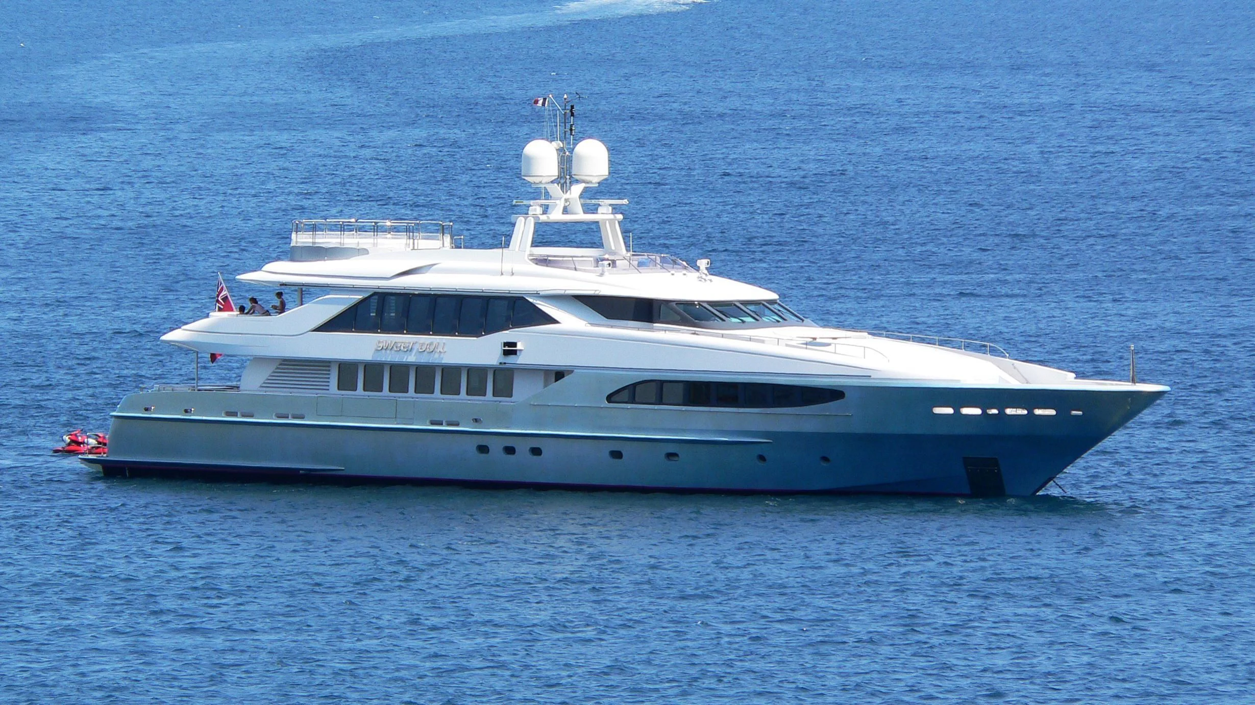 a large white boat in the water aboard KING LOUIS Yacht for Sale