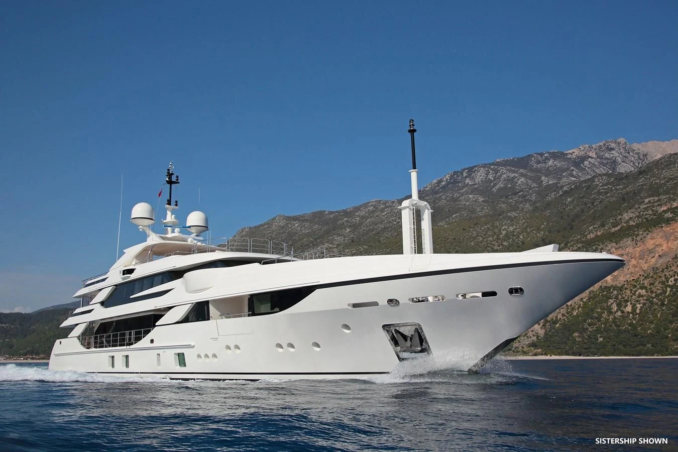 a white yacht in the water aboard TRIUMPH Yacht for Sale