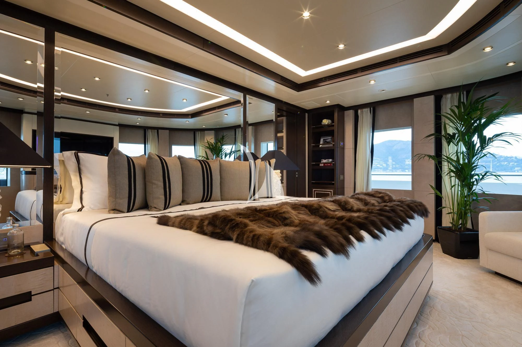 a bed in a room aboard TRIUMPH Yacht for Sale