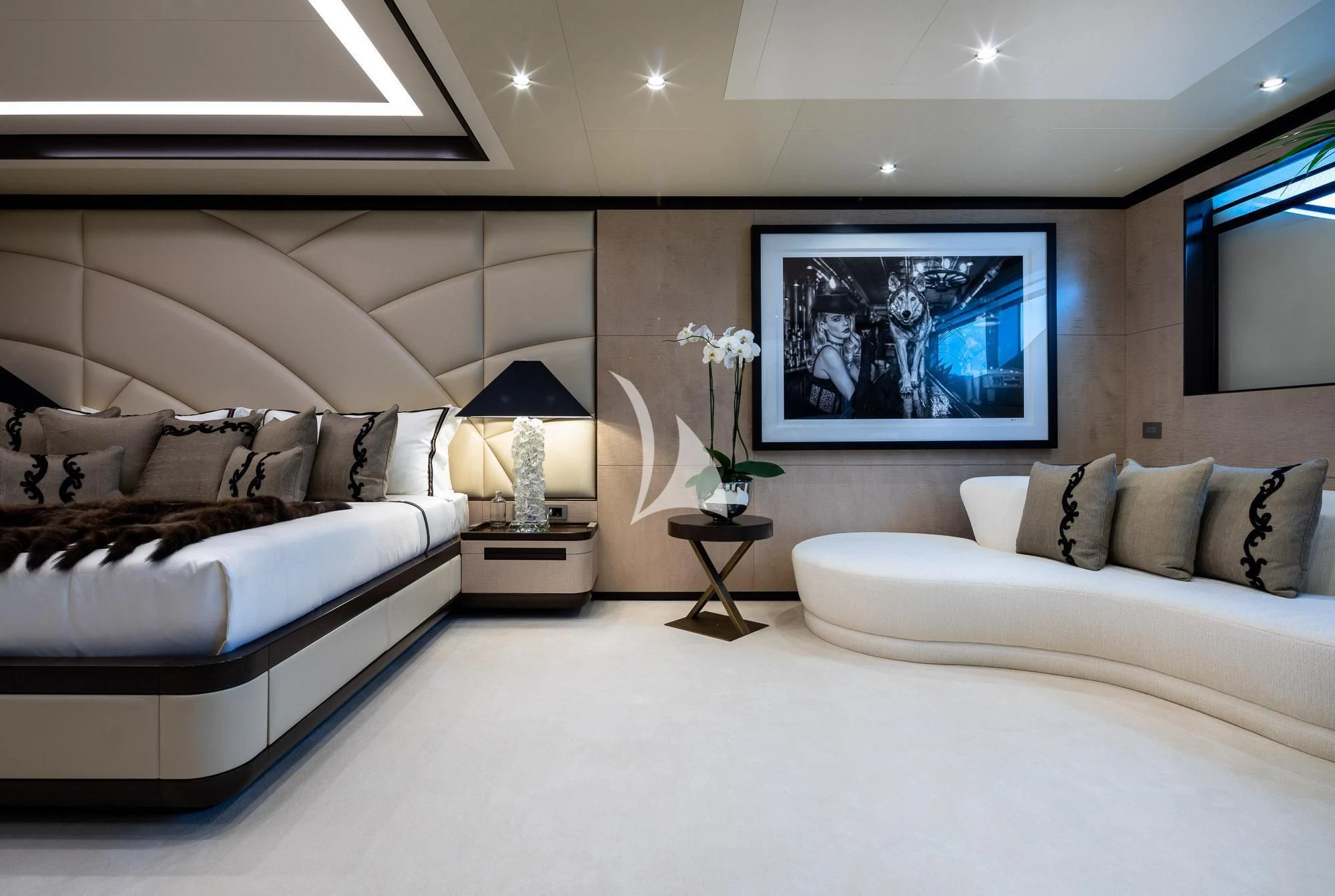 a living room with a large screen aboard TRIUMPH Yacht for Sale