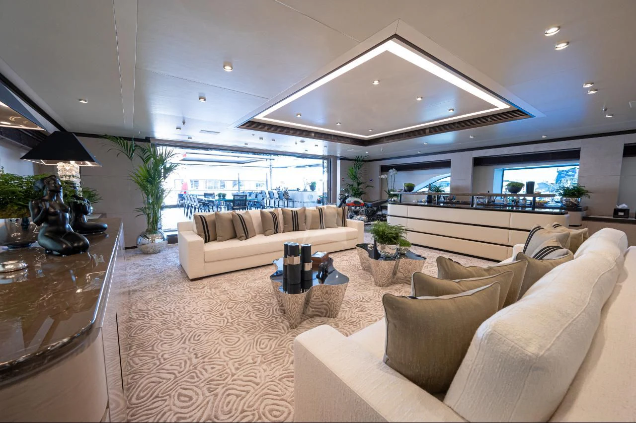 a living room with a large window aboard TRIUMPH Yacht for Sale